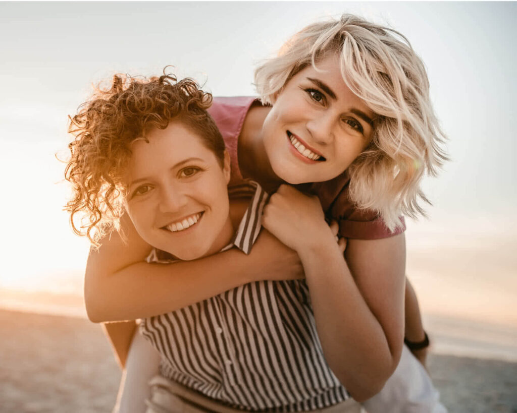 Couple smiling on the beach together